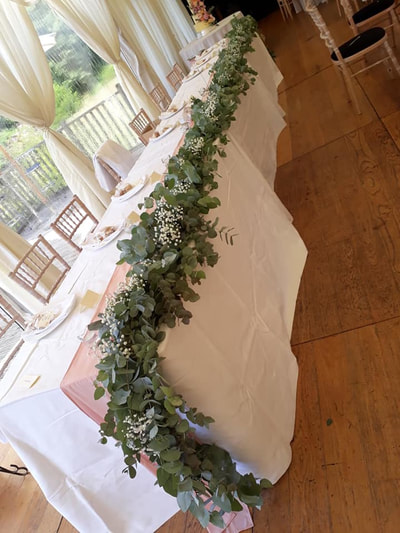 Top Table garland from ( (£20.00 per foot) 
